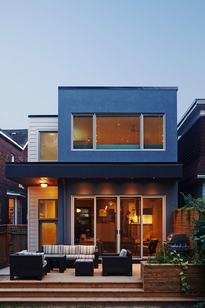 alt="high park-toronto-home addition-two storey home-open concept wooden backyard patio"